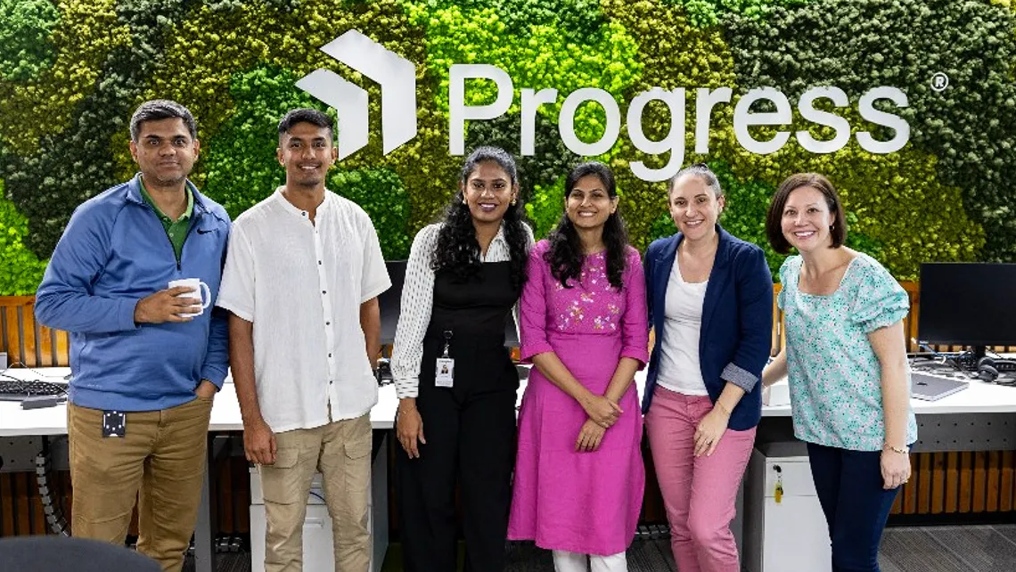employees in a photo in the progress india office